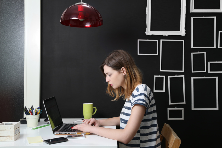 Young woman in front of laptop